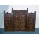 A Late 19th Century Carved Oak Inverted Break Front Side Cabinet with Fielded Panel Doors and