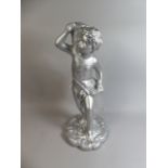 A Silver Painted Marble Effect Study of Standing Cherub Carrying Basket of Grapes,