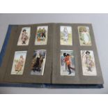 A Small Late Victorian Cigarette Card Album Containing Mixed Cards