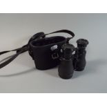 A Pair of Vintage Binoculars in Case