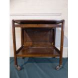 An Oak Drop Leaf Trolley with Stretcher Shelf,