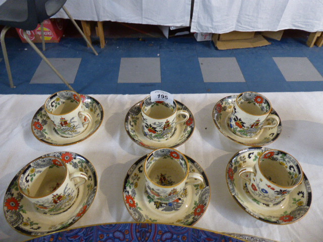 A Set of Six Coalport Canton Coffee Cans and Saucers