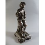 A 19th Century Silver Plated Figure of a Street Urchin.