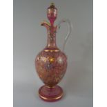 A Pretty Pink Glass Claret Jug with Gilt and Enamelled Decoration.
