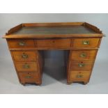 A Late Victorian Mahogany Twin Pedestal Campaign Desk by Arthur Foley and Son,