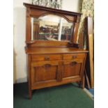 A Nice Quality Oak Arts and Crafts Mirror Back Sideboard with Blind Carved Tulip Decoration.
