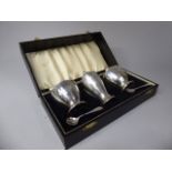 A Cased Cruet Set Comprising Salt, Mustard Pepper and Two Spoons, Monogrammed W.