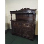 A Late 19th Century Carved Oak Buffet with Two Drawers Over Cupboard Base,