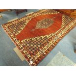 An Antique Persian Mazleghan Rug 195x126cm