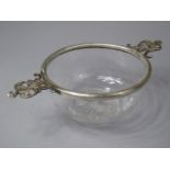 A Silver Mounted Glass Quaish with Stylized Angel Handles. London 1900. 8cm Diameter. 4.