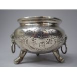 A Chinese Silver Plated Bowl with Two Lion Mask Ring Carrying Handles and on Tripod Claw Feet.