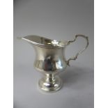 A Silver Bachelors Cream Jug on Turned Stepped Circular Foot. Chester 1939.