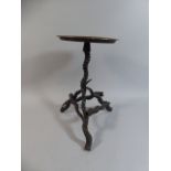 An Indo-Colonial Tripod Table. The Base Formed From Blackbuck Horns, Copper Circular Top.