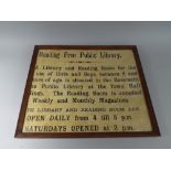 An Early 20th Century Public Library Sign in a Glazed Oak Frame.