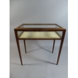 An Edwardian Framed Bijouterie Table on Square Tapering Legs.