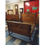 A 19th Century Oak Double Bed with Carved Acanthus Leaf Decoration.