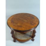 A Nice Quality Crossbanded Walnut Circular Table with Cane Stretcher Shelf,