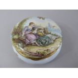 A Wonderfully Enamelled Circular Powder Box with Gilded Interior and Decorated with Maidens Seated