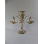 A Weighted Silver Epergne Basewith Circular Foot Leading to Octagonal Fluted Stem,