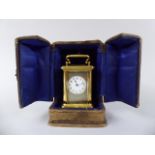 A French Leather Cased Miniature Gilt Brass Carriage Clock,