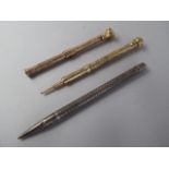 A Collection of Three Late 19th Century Propelling Pencils, One Silver,