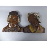 A Pair of 19th Century Carved Oak Wall Plaques Modelled as an Elderly Man and Woman.