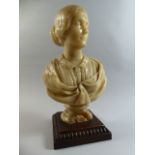 A 19th Century Sculpted Wax Bust of a Young Woman, Signed H.J.