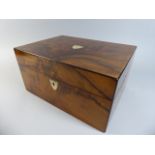 A 19th Century Walnut Ladies Work Box with Shield Shaped Mother of Pearl Escutcheons.