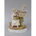 A Continental Porcelain Figure Group by Sitzendorf Depicting Boy and Girl with Bird Cage,