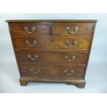 A 19th Century Oak Chest of Two Short and Three Graduated Long Drawers.
