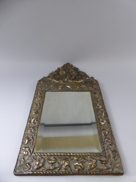 A 19th Century Dutch Brass Repousse Wall Mirror.