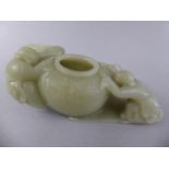 An Oriental Carved Green Jade Brush Pot or Washer Depicting Figures Struggling to Move Large