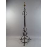 A Late 19th Century Arts and Crafts Wrought Iron Standard Lamp in the Style of W.A.