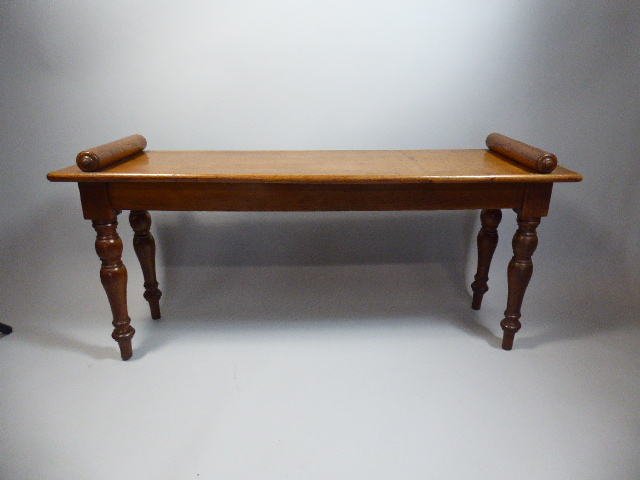 A Victorian Oak Rectangular Window Seat with Scrolled Stops and Turned Supports.