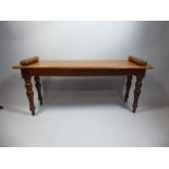 A Victorian Oak Rectangular Window Seat with Scrolled Stops and Turned Supports.