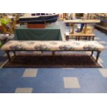 A Victorian Mahogany Country House Window Seat with Turned Supports.