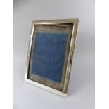 A Large Silver Easel Backed Photo Frame.