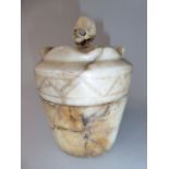 A 19th Century Continental Carved Alabaster Drug Jar with Skull Finial.