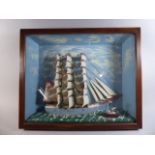 A 19th Century Folk Art Sailing Ship Diorama in a Glazed Wooden Case.