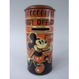 A Mid 20th Century British Made Happynak Tin Plate Mickey Mouse Savings Bank 15cm high