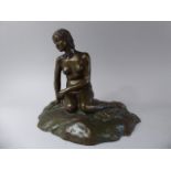 A 20th Century Bronze Figure of a Seated Mermaid in the Style of Edvard Eriksens 'The Little