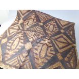 An African hand Painted Wall Hanging decorated with Geometric Patterns.