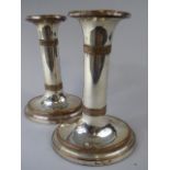 A Pair of Sheffield Plated Candle Sticks on Ovoid Stepped Bases. 16.