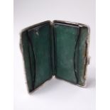 A Silver Card Case with Fitted Green Leather Interior. Etched Decoration and Monogrammed EC.
