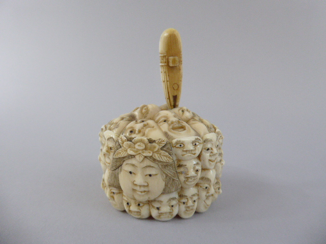 A 19th Century Japanese Carved Ivory Box Decorated with Samurai Mask, - Image 2 of 2