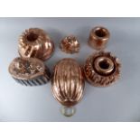 A Collection of Seven Victorian Copper Jelly Moulds and Blancmange Moulds of Various Types