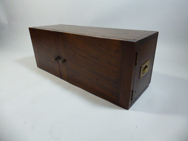 An Early 19th Century Mahogany Campaign Cupboard with two Doors Flanked by Two Brass Carrying - Image 3 of 3