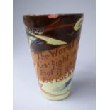 A Glazed Terracotta Beaker with Text ' The World has A Battle Room For All,