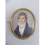 An Oval Brooch Miniature of 18th Century Young Man. In Gold Mounted Silver Frame. 5.