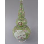 A Famille Verte Double Gourd Vase Decorated with Swallows, Willow Tree and Flowers.